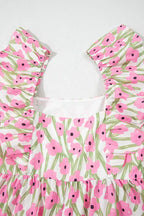 Pink floral ruffle sleeve dress with green stems on white background, women's spring fashion