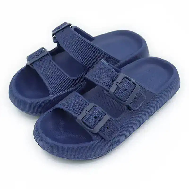 Navy blue double buckle slide sandals with textured straps and open toe design