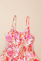 Pink and orange floral women’s sundress with spaghetti straps and ruched waist