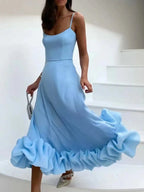 Light blue ruffle hem maxi dress with spaghetti straps, perfect for women’s boutique fashion