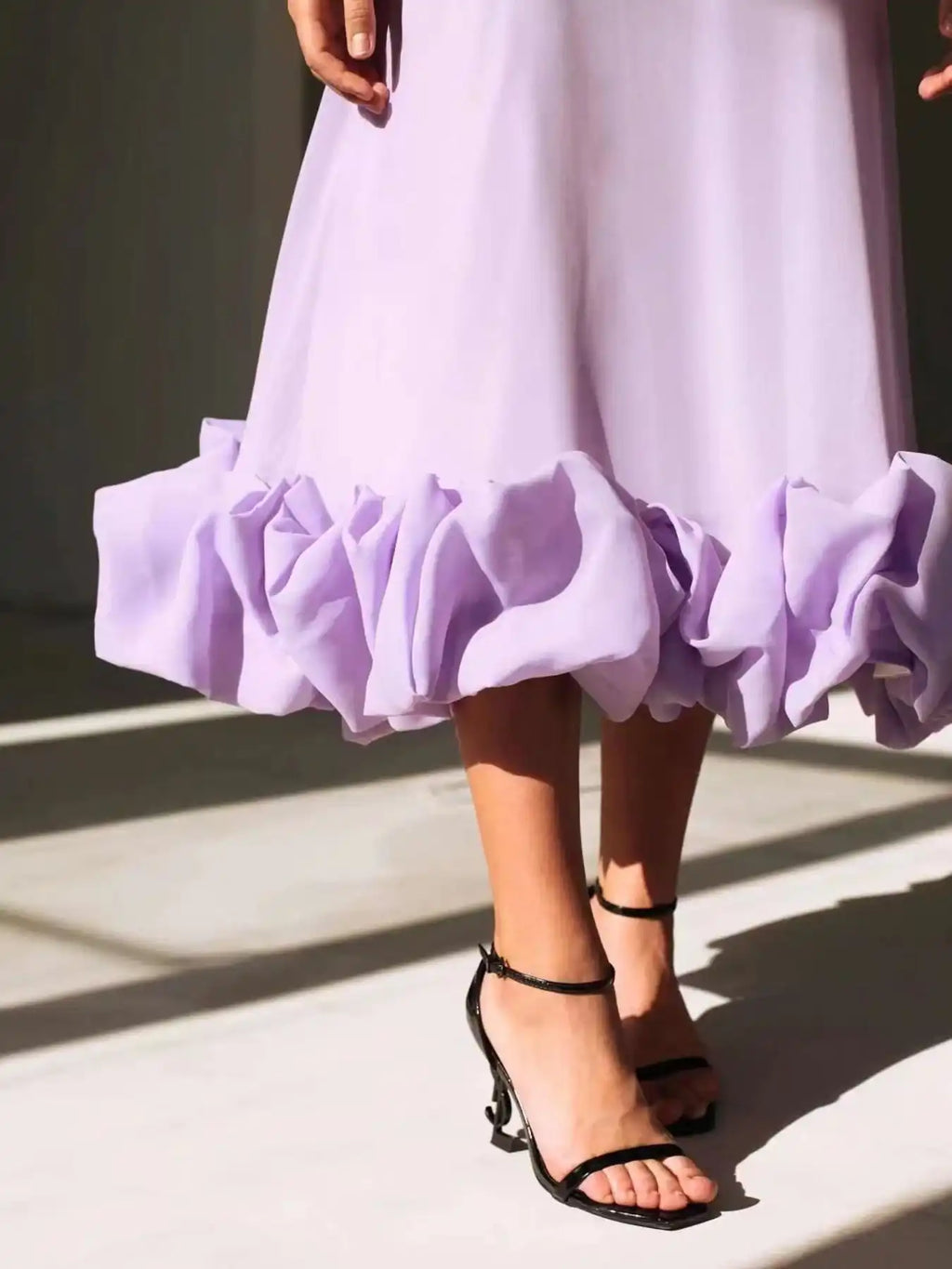 Lavender ruffle hem dress with black ankle strap heels for trendy women's fashion